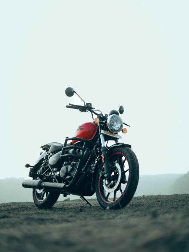 A Royal Enfield Meteor motorcycle parked in an outdoor setting, showcasing its design.